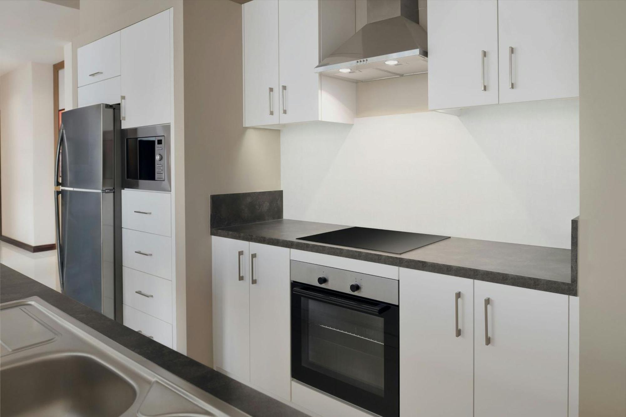 Delta Hotels By Marriott City Center Doha Exterior foto A typical kitchen in a student apartment